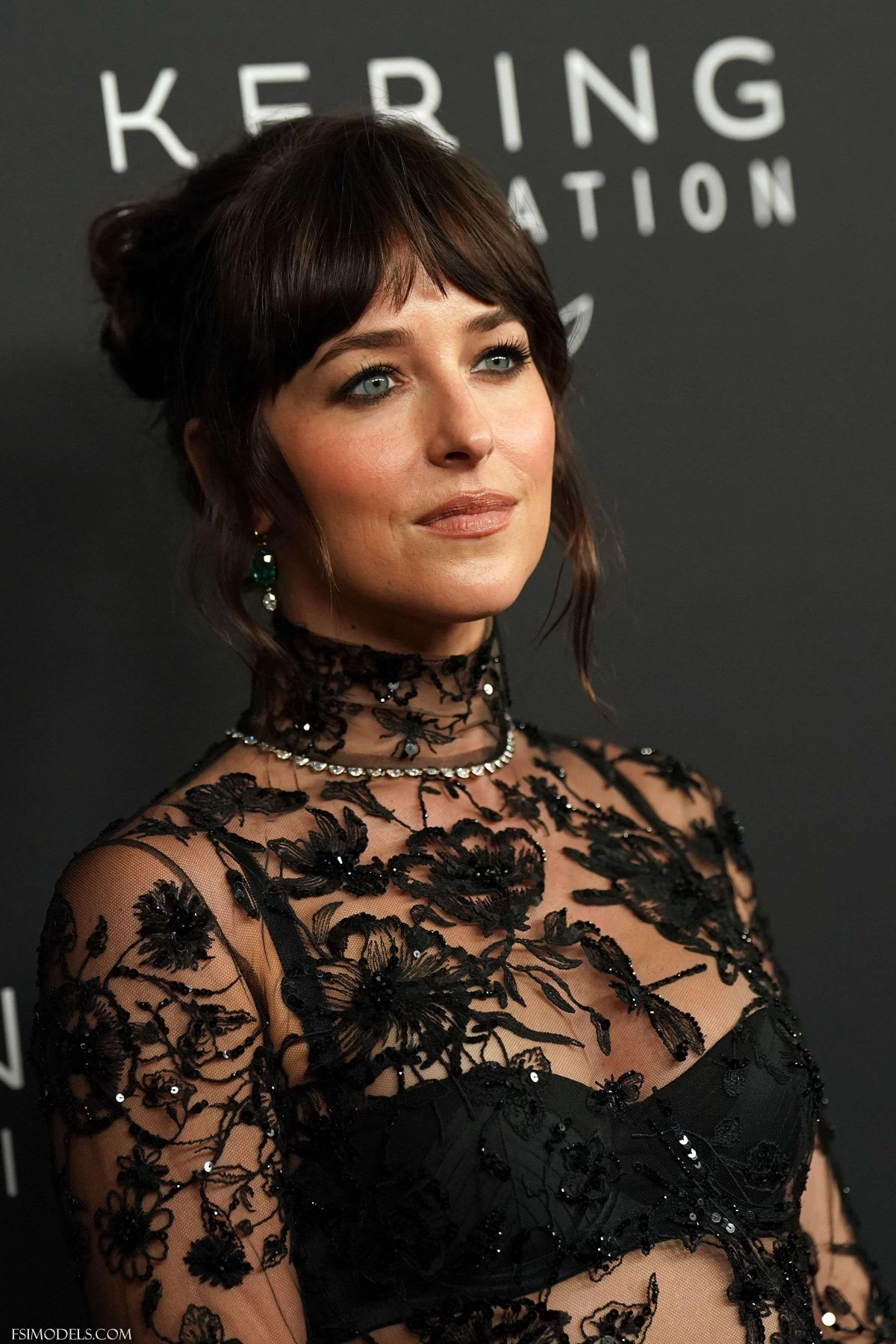 Dakota Johnson's Daring Gucci Gown Set - 5