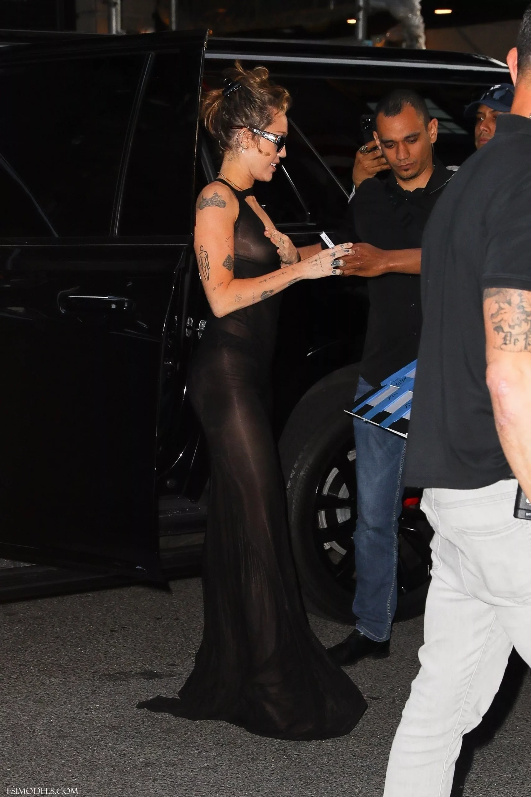 Miley Cyrus Braless NYC Hotel Outdoor Photos - 13