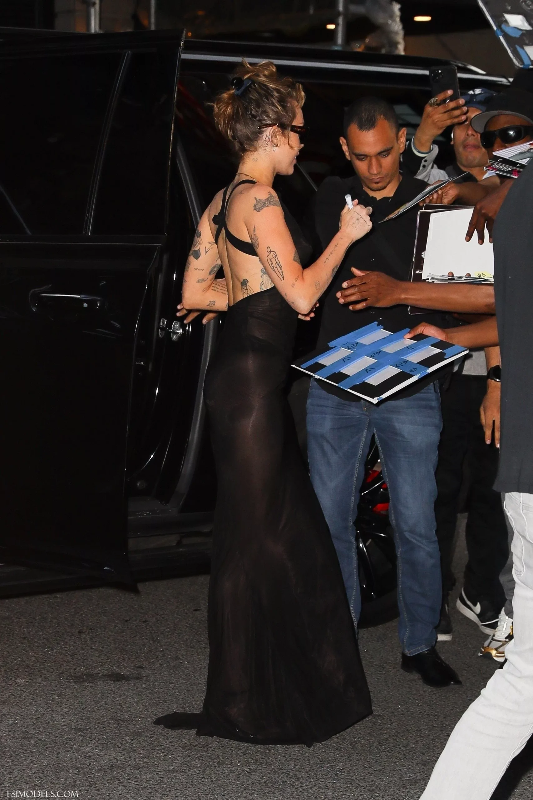 Miley Cyrus Braless NYC Hotel Outdoor Photos - 17